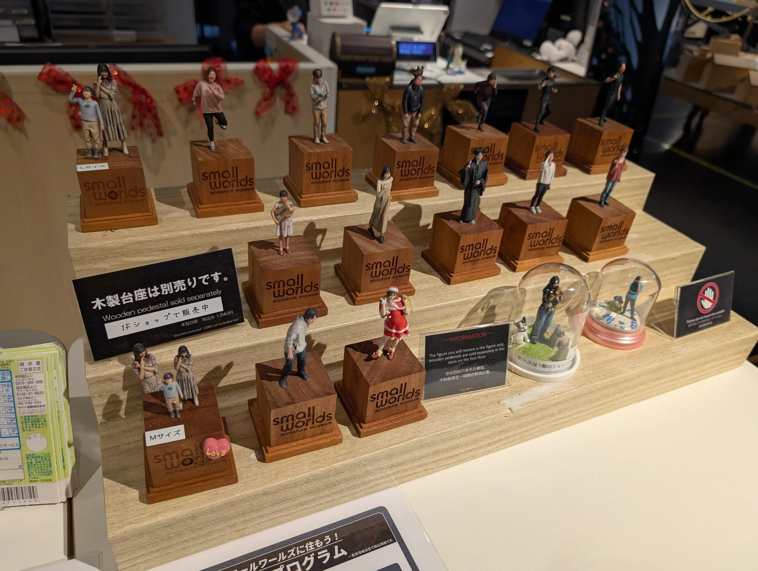 A close view of detailed miniature scenery in a museum display.